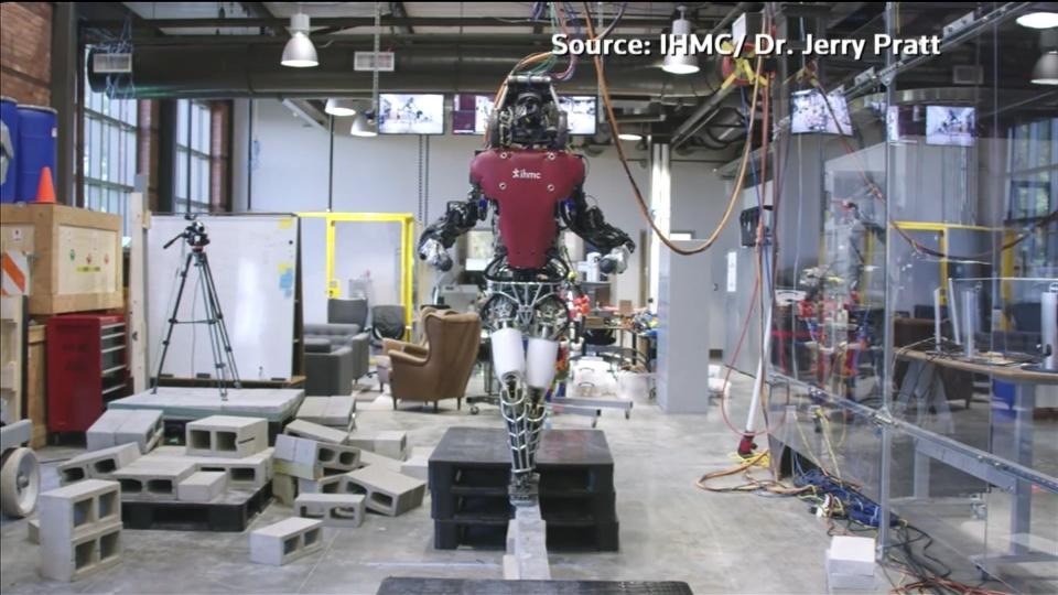 Humanoid Robot walks tightrope-like walkway